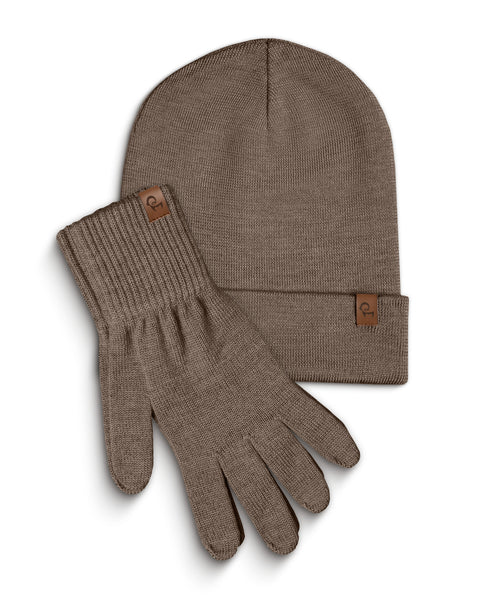A brown knitted beanie and a pair of matching gloves are laid flat against a white background. Both the beanie and each glove have a small, rectangular brown leather tag with a menique logo on them. The items are slightly overlapping, with the beanie positioned above and to the left of the gloves.