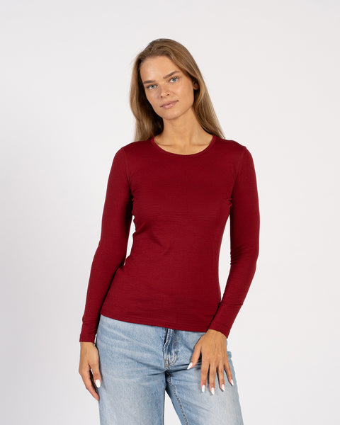 Woman wearing royal cherry Merino wool thermal long sleeve – front view