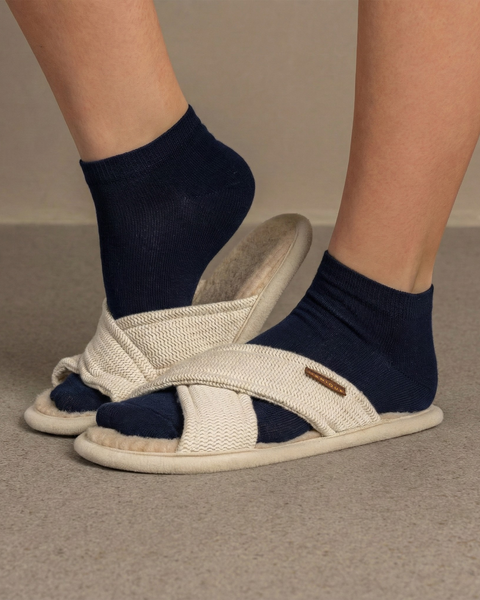 Blue bamboo ankle socks worn with indoor slippers, lightweight socks for home wear