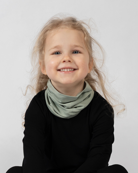 Kids bamboo neck gaiter in sage green, lightweight breathable accessory for layering.