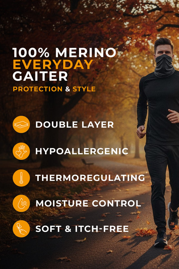 Man running through an autumn park wearing a dark merino neck gaiter; overlay text: “100% Merino Everyday Gaiter—Protection & Style: double layer, hypoallergenic, thermoregulating, moisture control, soft & itch-free.”