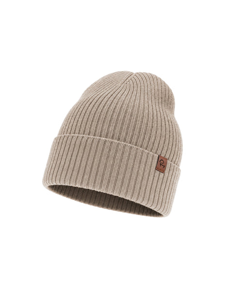 A sand beige ribbed knit beanie featuring a folded brim with a small brown square logo tag on the side, displayed against a plain white background.