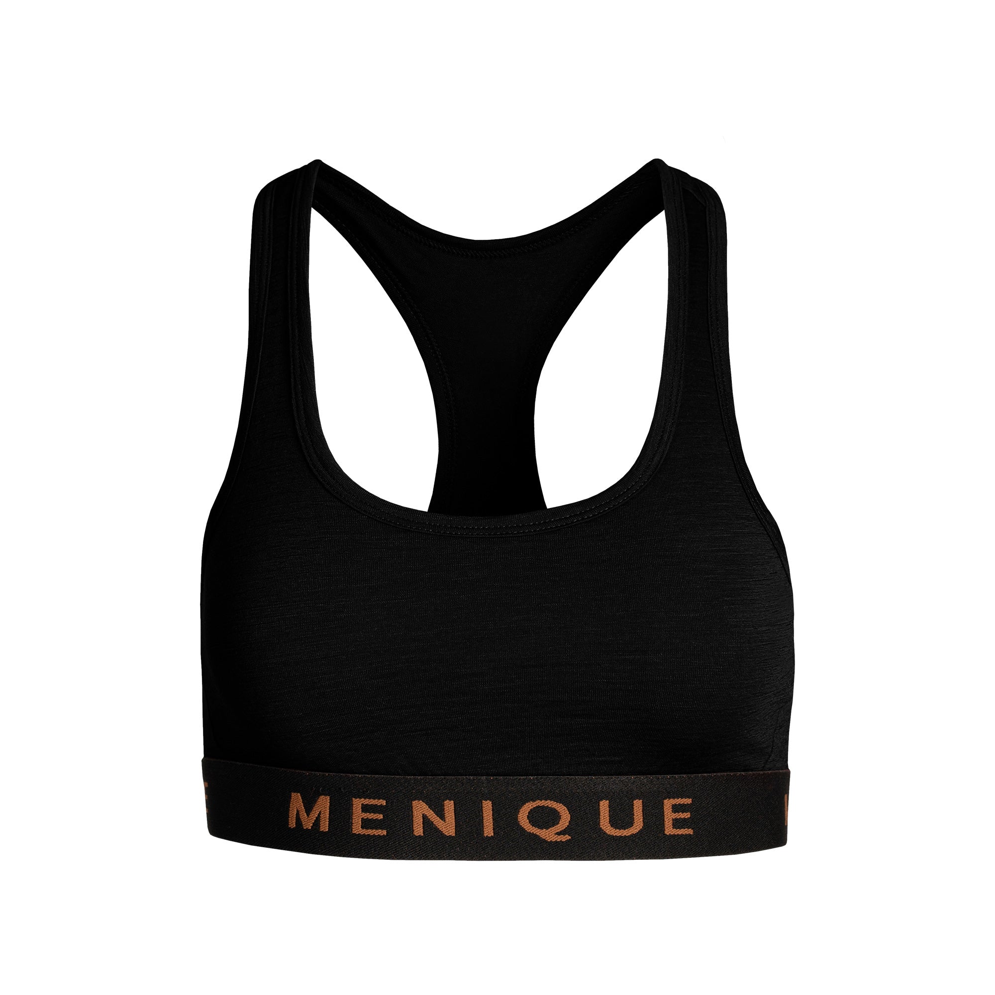 Woman wearing a black Merino wool sports bra with racerback design, posing with one arm raised.